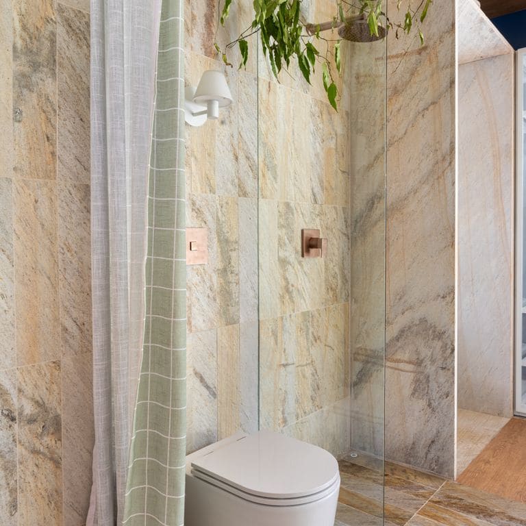 Application image for Golden Strata Gneiss. The image shows this material being used in an interior cladding application. Dominant colors shown are tan and cream. The color mix creates a warm feeling.