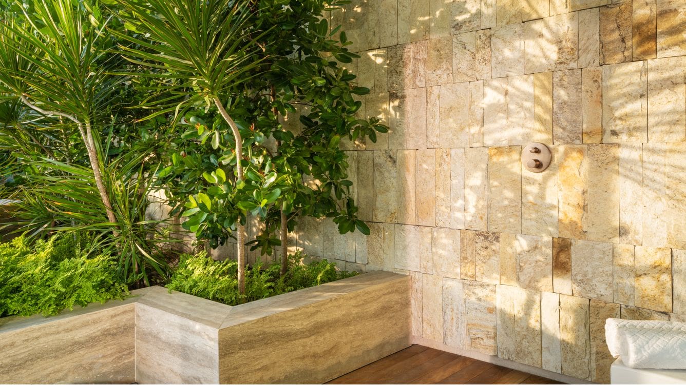 Application image for Golden Strata Gneiss. The image shows this material being used in a full bed veneer application. The surface finish shown is split-face. Dominant colors shown are yellow and tan. The color mix creates a warm feeling.