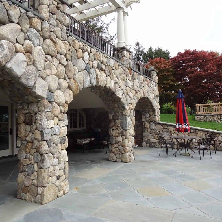 Application image for Boston Blend Granite. The image shows this material being used in a full bed veneer application. The surface finish shown is . Dominant colors shown are brown, gray and tan. The color mix creates a warm feeling.