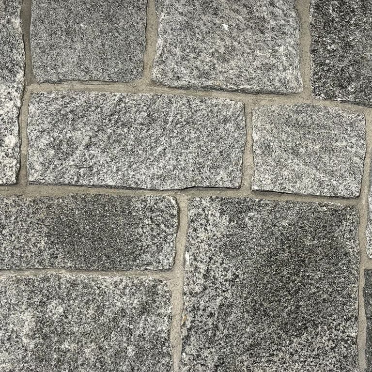 Color/Finish variation image for Oyster Bay Granite. The surface finish shown is . The dominant color shown is gray. The color mix creates a cool feeling.