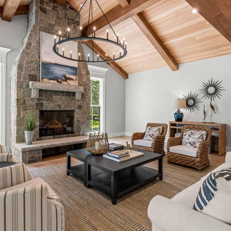 Application image for Oyster Bay Granite. The image shows this material being used for fireplace surround and thin veneer. The surface finish shown is . The dominant color shown is gray. The color mix creates a cool feeling.