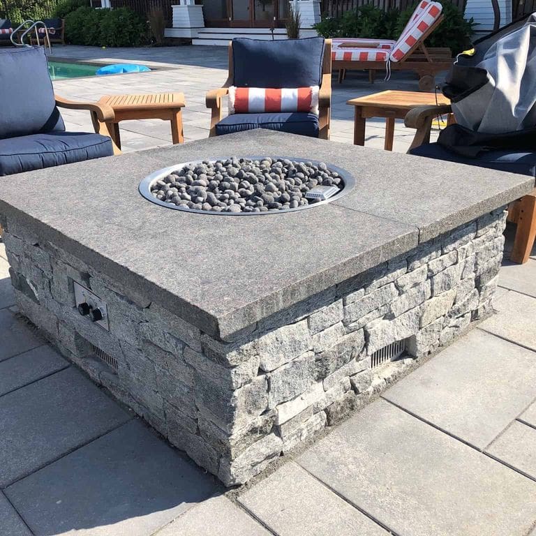 Application image for Oyster Bay Granite. The image shows this material being used in a thin veneer application. The dominant color shown is gray. The color mix creates a cool feeling.