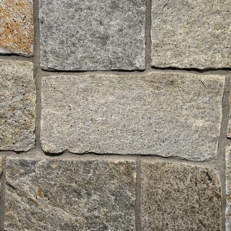 Color/Finish variation image for Newport Mist Granite. The surface finish shown is . Dominant colors shown are beige, brown, gray and tan. The color mix creates a warm feeling.