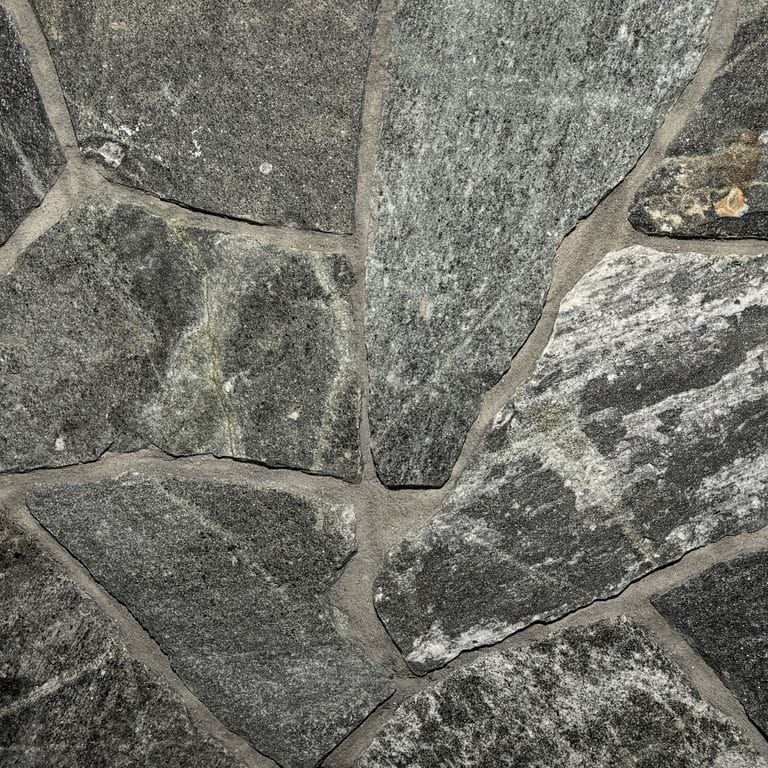 Color/Finish variation image for Greenwich Gray Granite. The surface finish shown is . Dominant colors shown are black, green and gray. The color mix creates a cool feeling.