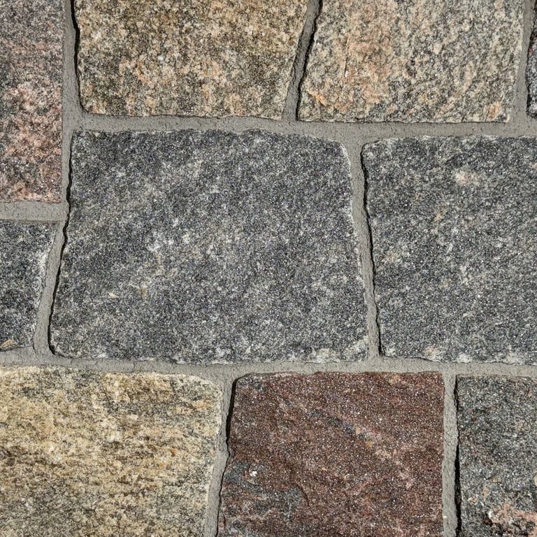 Color/Finish variation image for Vineyard Granite. The surface finish shown is . Dominant colors shown are brown and gray. The color mix creates a warm feeling.