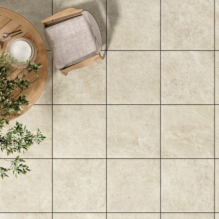 Feature image for Hero Snow. The image shows this material being used in a patio pavers application. The surface finish shown is . Dominant colors shown are beige and tan. The color mix creates a warm feeling.