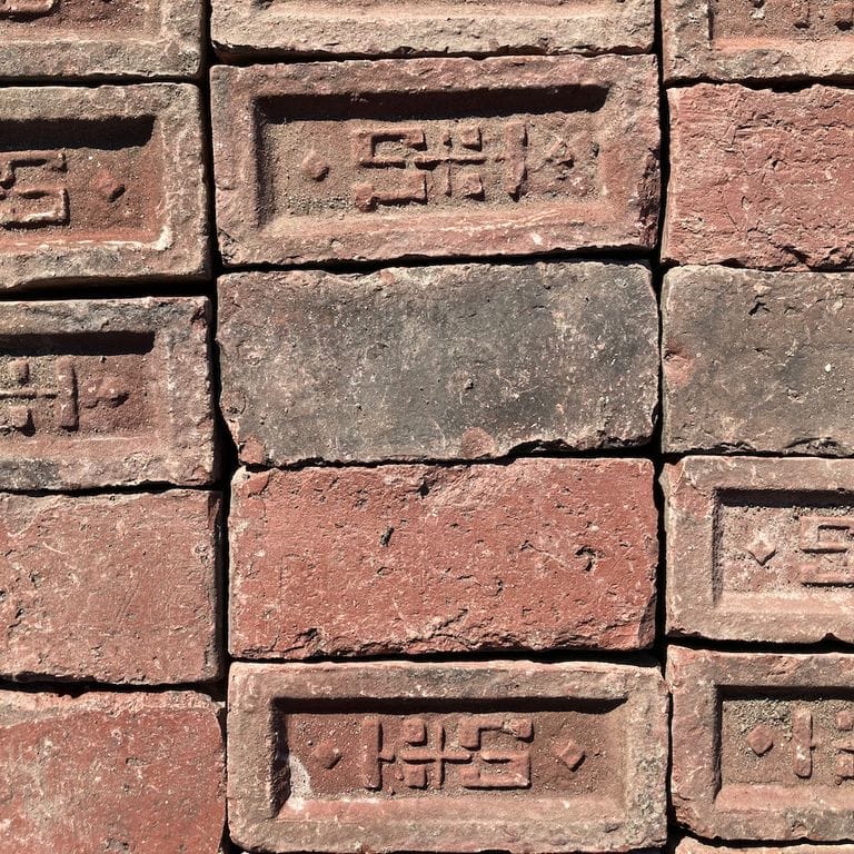 Application image for Reclaimed Brick Pavers. The surface finish shown is . Dominant colors shown are beige, brown, orange/rust and tan; with a black secondary. The color mix creates a warm feeling.