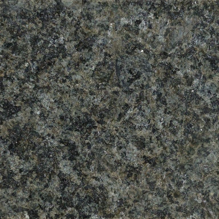 Color/Finish variation image for Laurentian Green Granite. The surface finish shown is flamed. Dominant colors shown are black, brown, green and gray. The color mix creates a cool feeling.