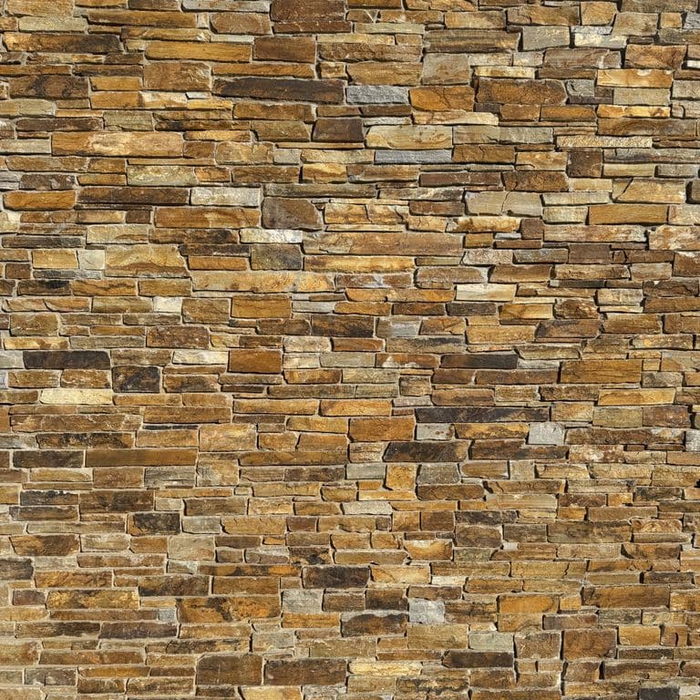 Best close-up image for Oakley Stone - Gold. The surface finish shown is split-face. Dominant colors shown are brown and orange/rust. The color mix creates a warm feeling.