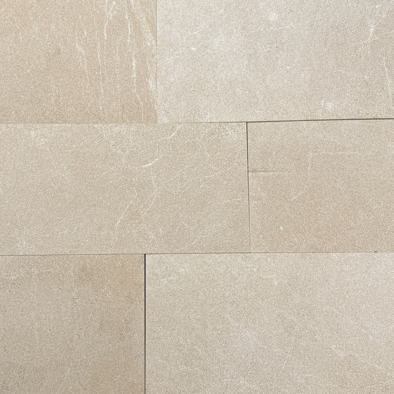 Color/Finish variation image for Oxford Cream Limestone. The surface finish shown is sand blasted. Dominant colors shown are beige and tan. The color mix creates a warm feeling.