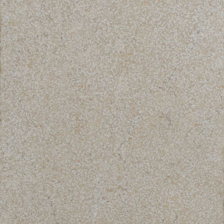 Swatch image for Mediterranean Cream Limestone. The surface finish shown is sand blasted. Dominant colors shown are beige and tan. The color mix creates a warm feeling.