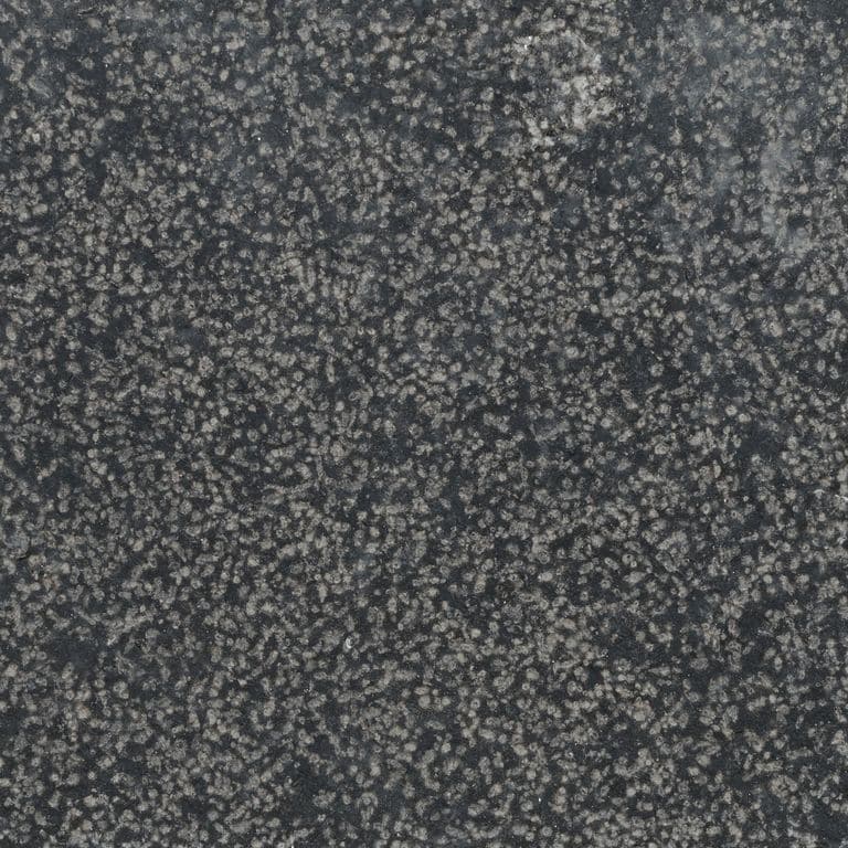 Color/Finish variation image for Waltin Black Limestone. The surface finish shown is bush hammered. Dominant colors shown are black and gray. The color mix creates a cool feeling.
