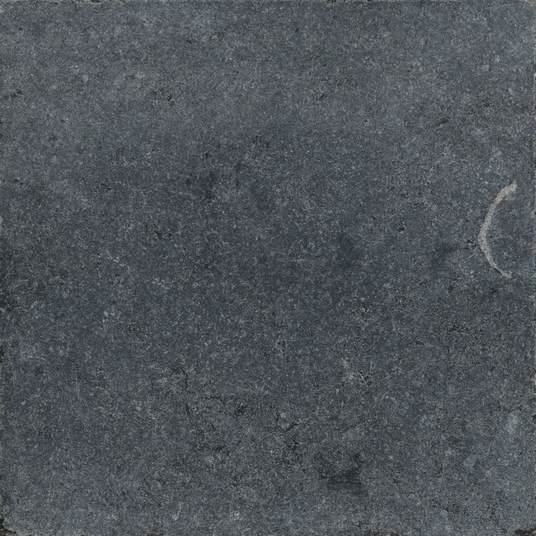 Color/Finish variation image for Waltin Black Limestone. The surface finish shown is tumbled. Dominant colors shown are black and gray. The color mix creates a cool feeling.