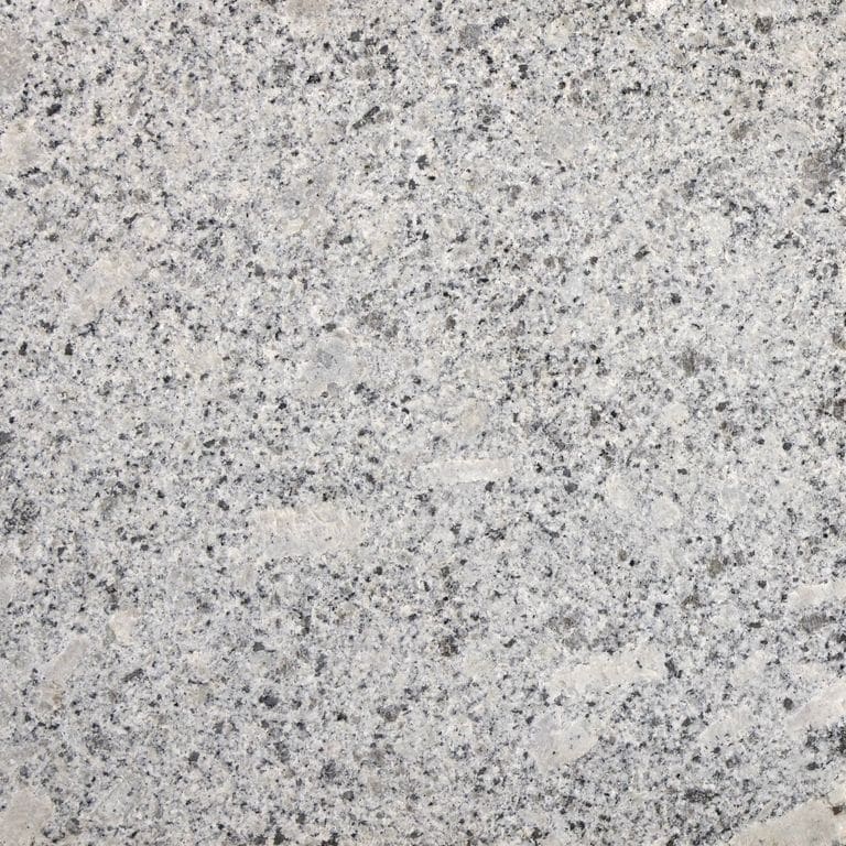 Color/Finish variation image for Oak Mountain Granite. The surface finish shown is flamed. The dominant color shown is gray; with beige, pink, purple, white and cream secondaries. The color mix creates a cool feeling. Regular, speckled and blotched color patterns.