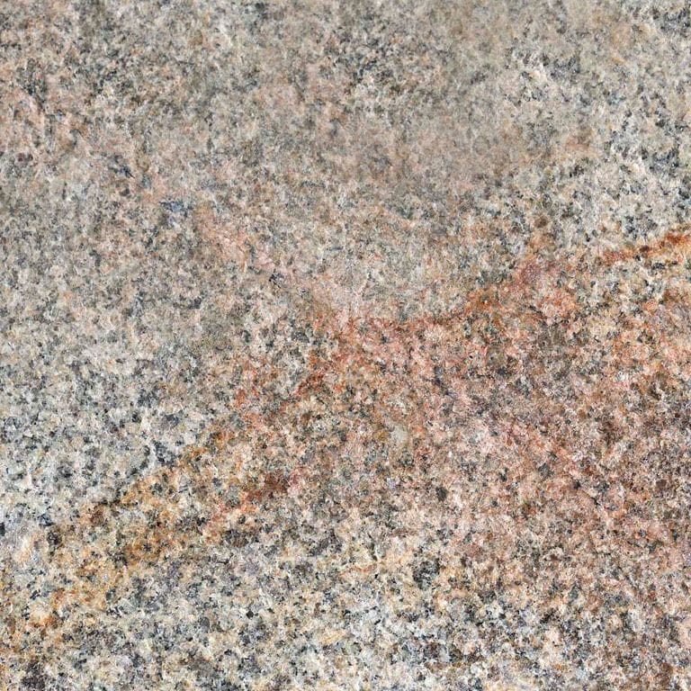 Color/Finish variation image for Granite - Cape Neddick Full Color. The surface finish shown is flamed. Dominant colors shown are beige and tan; with beige, brown, orange/rust, pink, purple, white and cream secondaries. Exhibits "movement" and the color mix creates a warm feeling. Speckled, blotched and coarse speckled color patterns. Contains lots of mica.