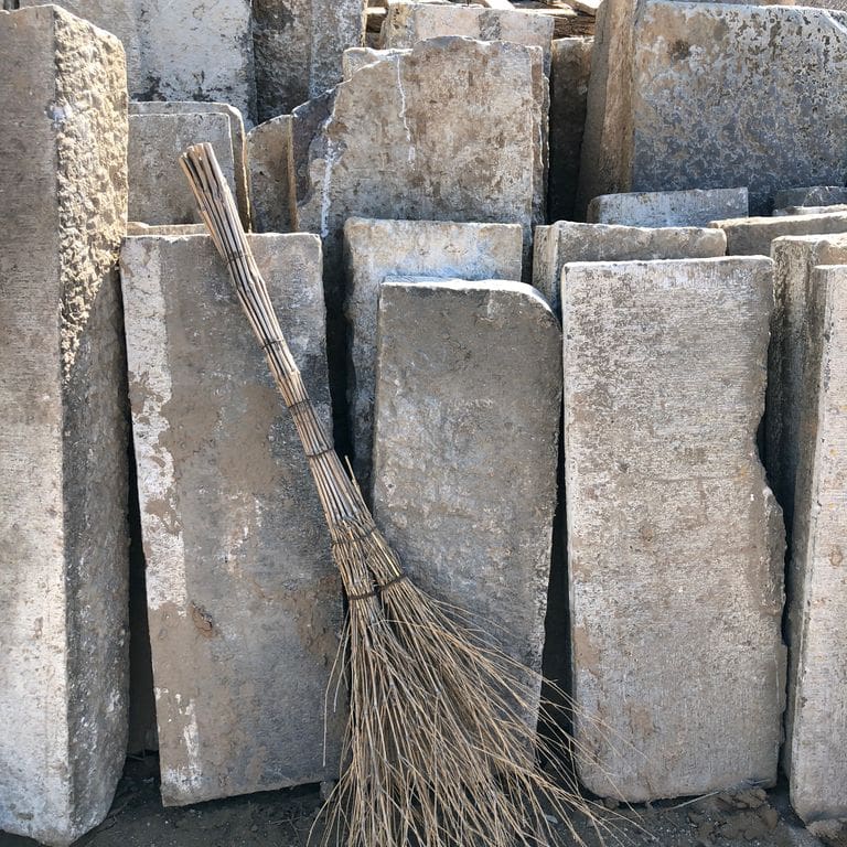 Application image for Reclaimed Highland Limestone Plank Pavers. The dominant color shown is gray; with beige, brown, white and tan secondaries. The color mix creates a warm feeling. Speckled, blotched and random color patterns.