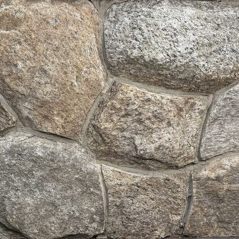 Color/Finish variation image for New England Fieldstone Rounds. The surface finish shown is weathered. Dominant colors shown are gray and tan. The color mix creates a warm feeling.