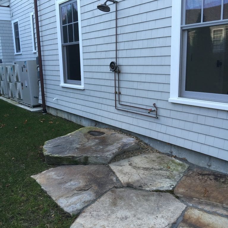 Application image for New England Fieldstone Pavers. The image shows this material being used in a patio pavers application.