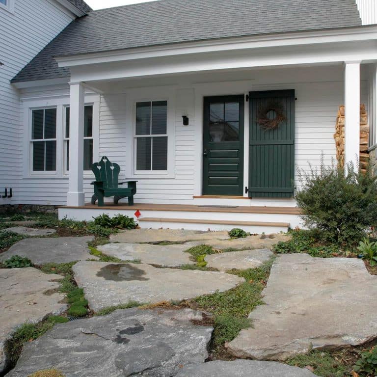 The image shows this material being used in a patio pavers application. The dominant color shown is gray; with brown, tan and cream secondaries. The color mix creates a warm feeling. Regular and random color patterns.