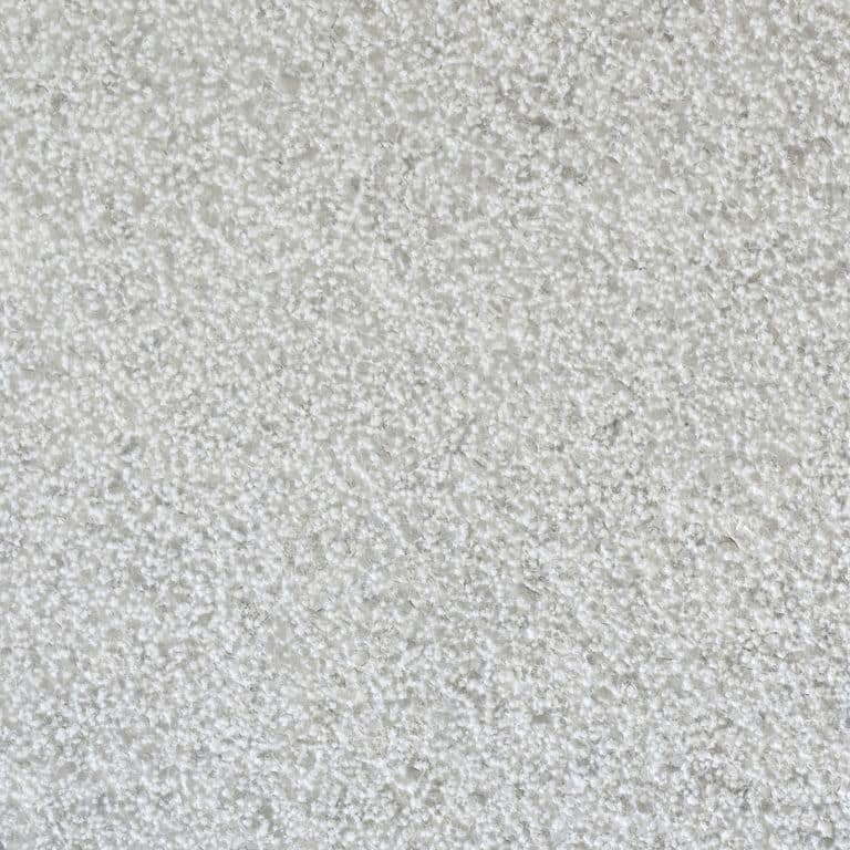 Color/Finish variation image for Mountain Hard Limestone - Blue. The surface finish shown is bush hammered. Dominant colors shown are gray and white. The color mix creates a cool feeling. Speckled and fine speckled color patterns.