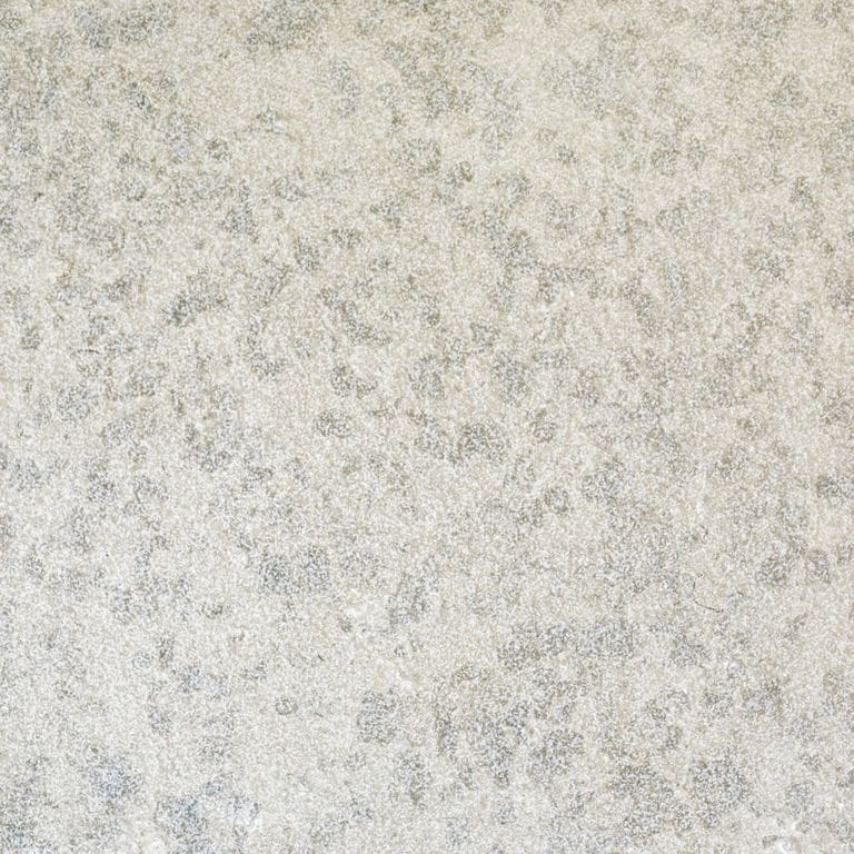 Color/Finish variation image for Mountain Hard Limestone - Blue. The surface finishes shown are brushed and sand blasted. Dominant colors shown are beige, gray, white and cream. Regular, fine speckled and blotched color patterns.