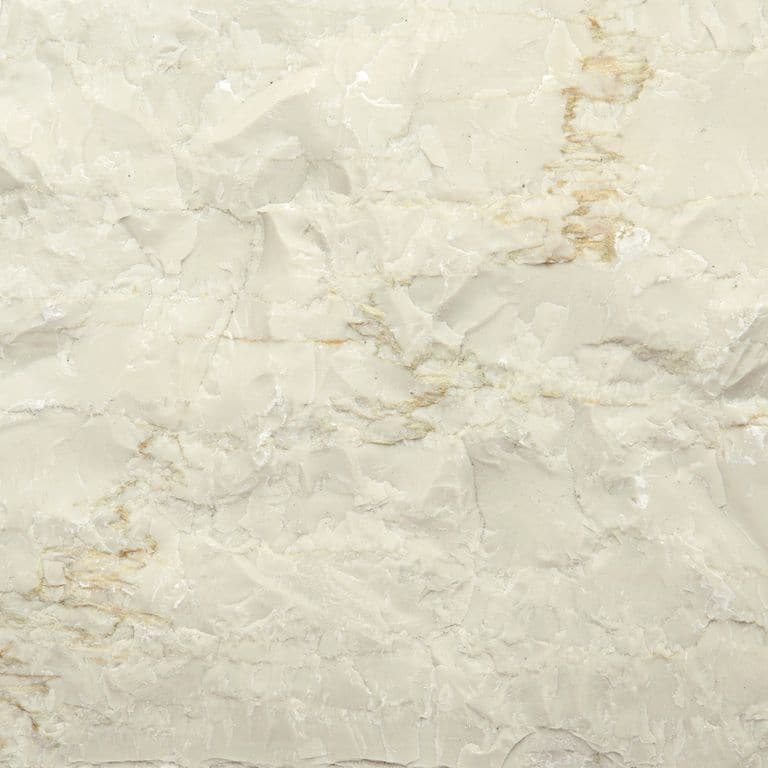 Color/Finish variation image for Mountain Hard Limestone - Beige. The surface finish shown is split-face. Dominant colors shown are beige and cream; with gray, white and tan secondaries. Exhibits "movement" and the color mix creates a warm feeling. Random and cloudy color patterns.