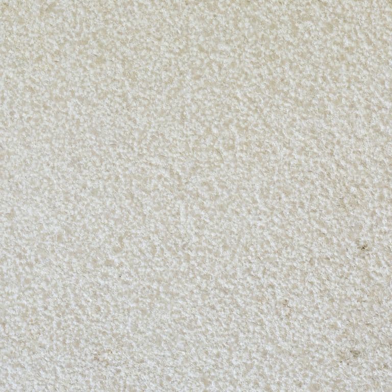 Color/Finish variation image for Mountain Hard Limestone - Beige. The surface finish shown is fine bush hammered. Dominant colors shown are beige, gray and white; with a cream secondary. The color mix creates a cool feeling. Speckled color pattern.