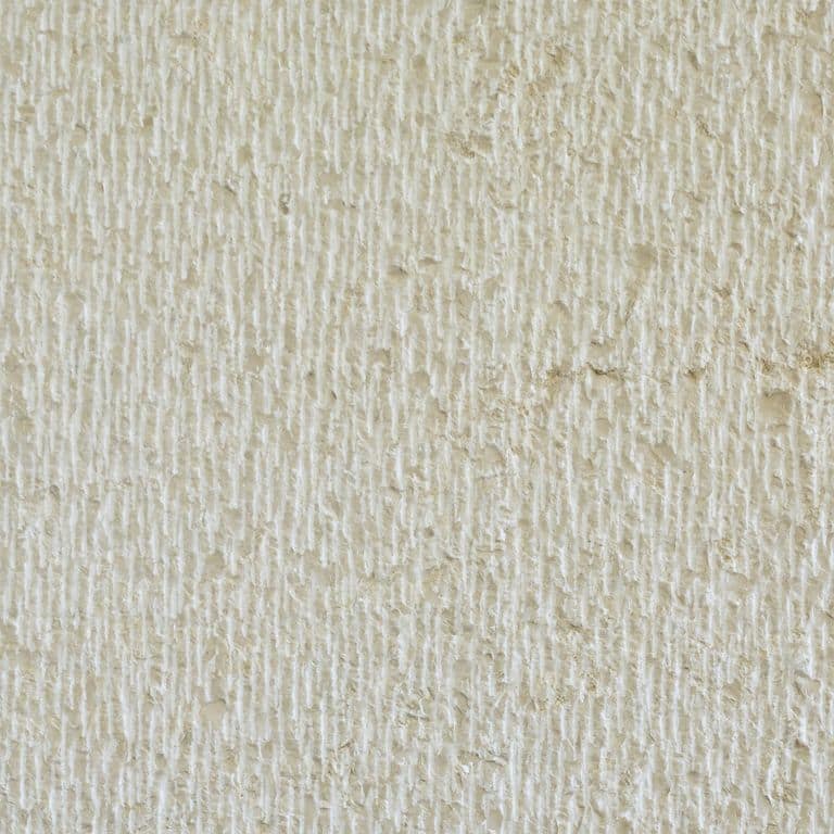 Color/Finish variation image for Mountain Hard Limestone - Beige. The surface finish shown is chiseled. Dominant colors shown are beige, gray and white; with tan and cream secondaries. The color mix creates a warm feeling. Speckled and linear color patterns.