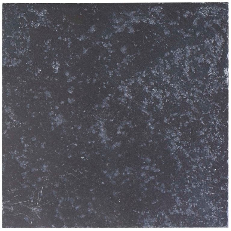 Color/Finish variation image for Limestone - Bahama Black. The surface finish shown is antiqued. The dominant color shown is gray; with black and green secondaries. Exhibits "movement" and the color mix creates a cool feeling. Blotched and coarse speckled color patterns.