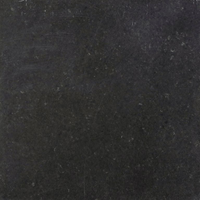 Feature image for Bahama Black Limestone. The dominant color shown is black; with brown and gray secondaries. The color mix creates a cool feeling. Solid color pattern.