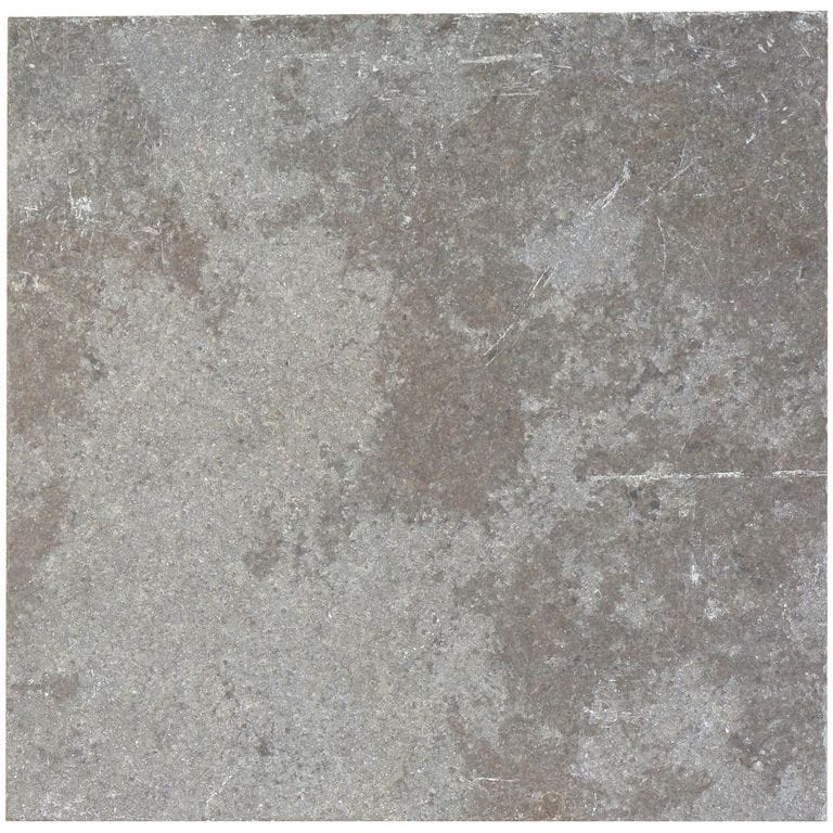 Color/Finish variation image for Mississippi Grey Limestone. The surface finishes shown are fine free form bush hammered and honed. The dominant color shown is gray; with beige, purple and white secondaries. Exhibits "movement" and the color mix creates a cool feeling. Blotched color pattern.