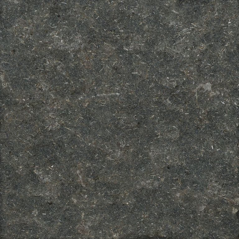 Swatch image for Nordic Black Basalt. The surface finish shown is flamed. The dominant color shown is gray. The color mix creates a cool feeling.