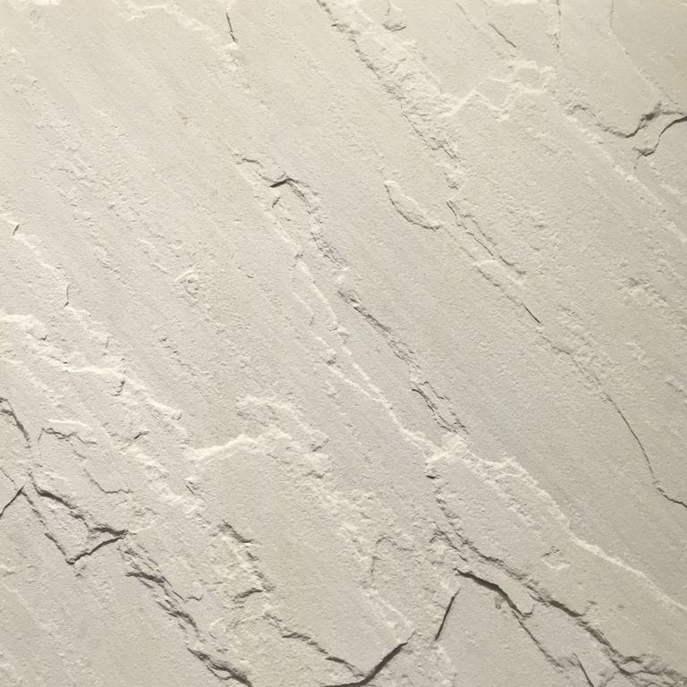 Swatch image for Sandstone - Portland White. Dominant colors shown are white and cream; with gray and white secondaries. Exhibits "movement" and the color mix creates a warm feeling. Regular and linear color patterns.