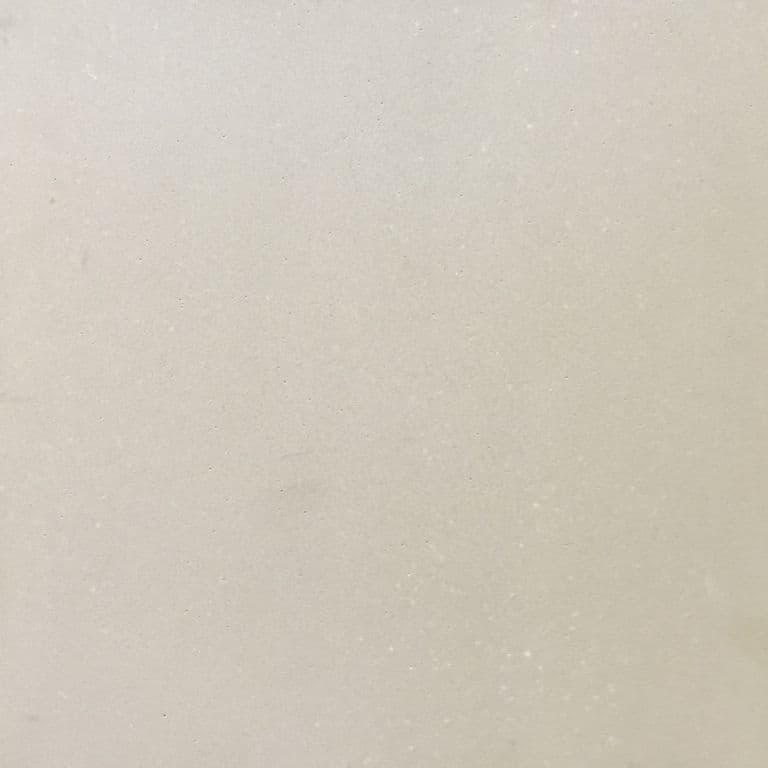Color/Finish variation image for Portland White Sandstone. The surface finish shown is honed. Dominant colors shown are beige and cream; with gray and white secondaries. Solid color pattern.
