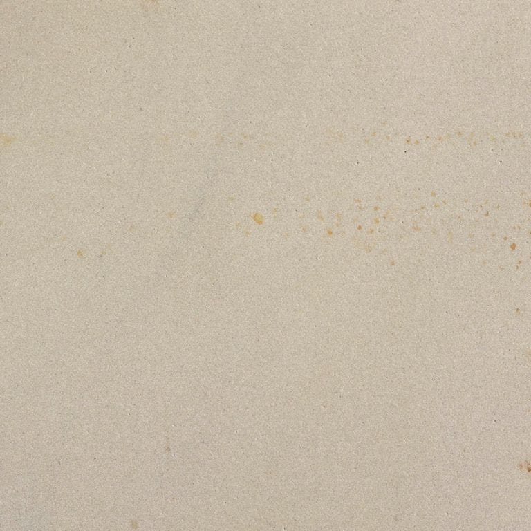Color/Finish variation image for Portland White Sandstone. The surface finish shown is sawn. Dominant colors shown are beige and tan; with brown, gray, white and cream secondaries. The color mix creates a warm feeling. Solid color pattern.