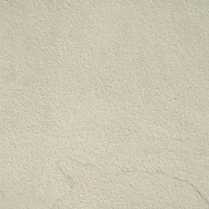 Color/Finish variation image for Portland White Sandstone. The surface finish shown is sand blasted. The dominant color shown is beige; with gray, white, tan and cream secondaries. The color mix creates a warm feeling. Solid, fine speckled and cloudy color patterns.