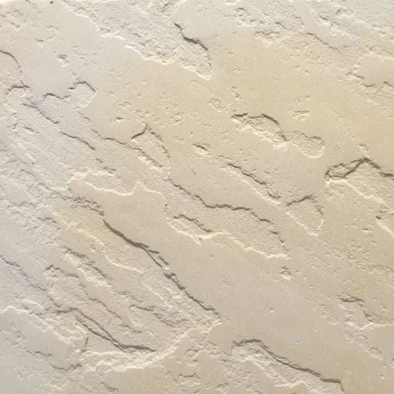 Color/Finish variation image for Portland Beige Sandstone. The surface finish shown is antiqued. The dominant color shown is beige; with gray, pink, white, tan and cream secondaries. Exhibits "movement" and the color mix creates a warm feeling. Regular color pattern.