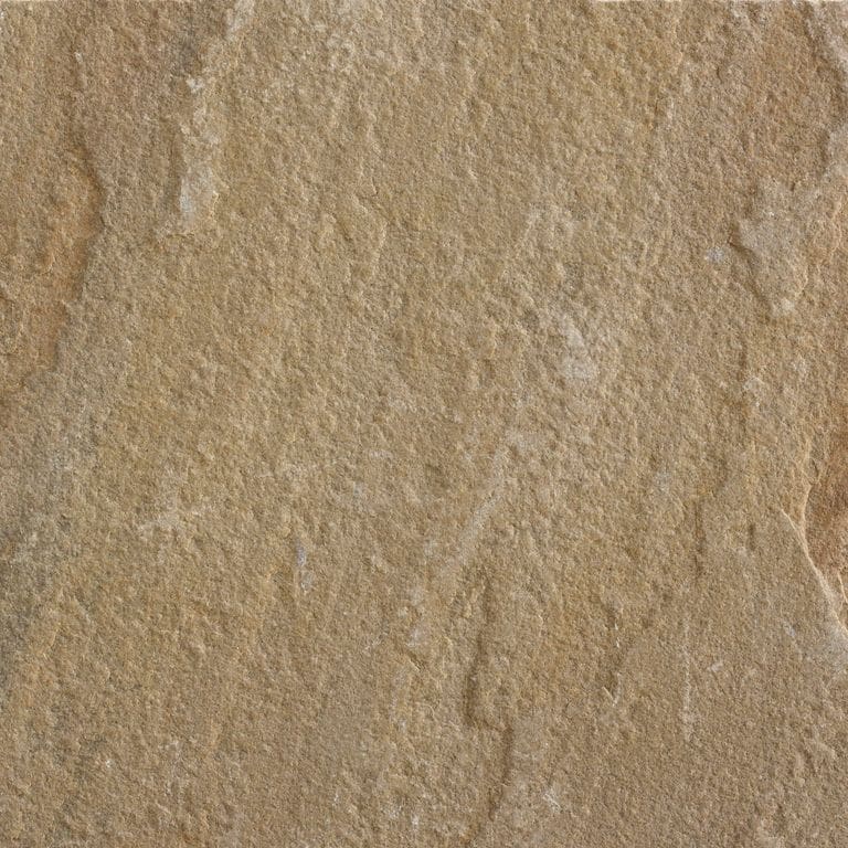 Close-up image for Rippon Sandstone. The surface finish shown is natural cleft. Dominant colors shown are brown and tan; with beige and orange/rust secondaries. Exhibits "movement" and the color mix creates a warm feeling. Regular and linear color patterns.
