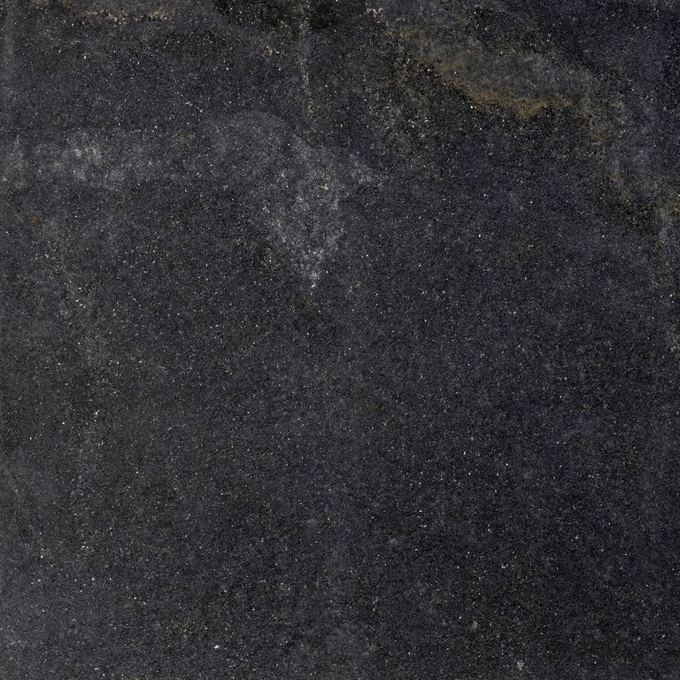 Color/Finish variation image for Black Quartzite. The surface finish shown is waterjet. The dominant color shown is black; with brown and gray secondaries. The color mix creates a cool feeling. Fine speckled, blotched, veined and cloudy color patterns.