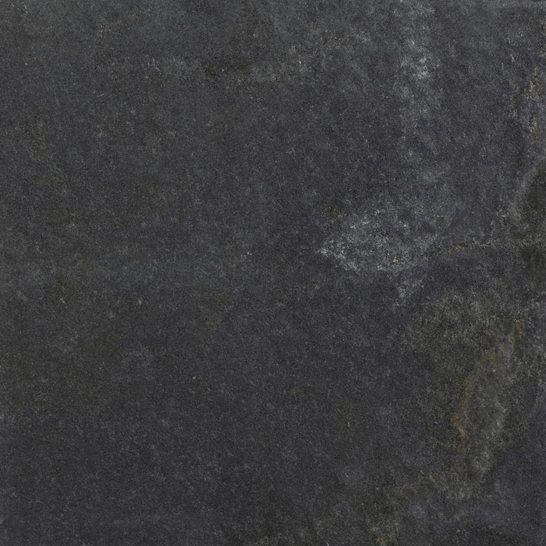 Color/Finish variation image for Black Quartzite. The surface finish shown is waterjet. Dominant colors shown are black, brown and gray; with a green secondary. Exhibits "movement" and the color mix creates a cool feeling. Random, fine speckled, blotched and cloudy color patterns.