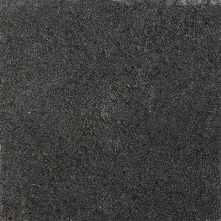 Color/Finish variation image for Metal Frost Quartzite. The surface finish shown is waterjet. Dominant colors shown are black, brown and gray. The color mix creates a cool feeling. Solid, speckled and cloudy color patterns.