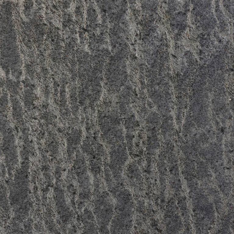Feature image for Metal Frost Quartzite. Dominant colors shown are brown and gray; with green and purple secondaries. The color mix creates a cool feeling. Regular color pattern.