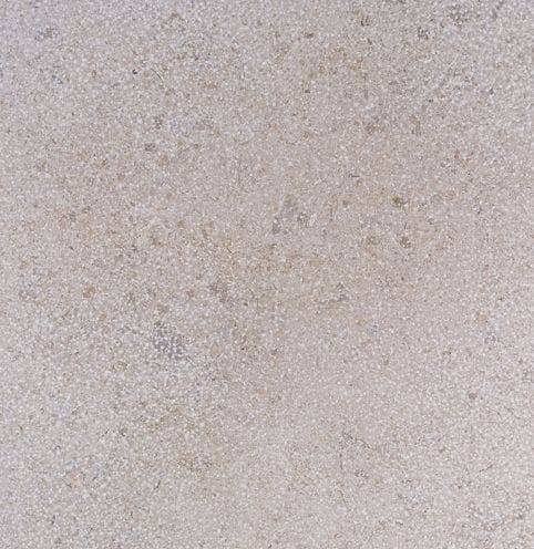 Color/Finish variation image for Topa Beige Limestone. Dominant colors shown are beige, gray and pink; with purple and white secondaries. The color mix creates a cool feeling. Fine speckled and cloudy color patterns.