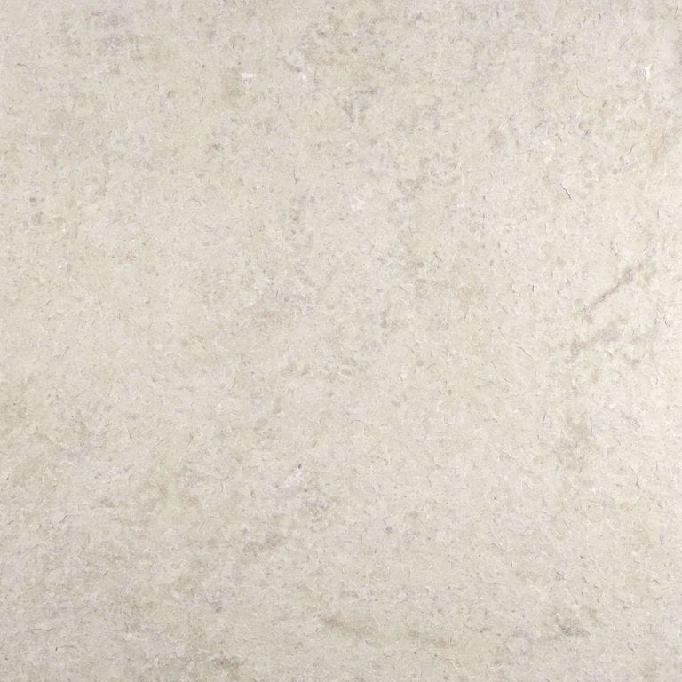 Color/Finish variation image for Classimo Beige Limestone. The surface finish shown is flamed. Dominant colors shown are beige and cream; with gray, white and tan secondaries. The color mix creates a warm feeling. Regular and cloudy color patterns.
