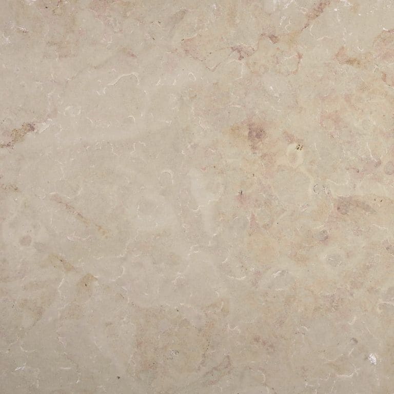 Color/Finish variation image for Cream Limestone. The surface finishes shown are brushed and flamed. Dominant colors shown are beige and tan; with brown, orange/rust and pink secondaries. Exhibits "movement" and the color mix creates a warm feeling. Blotched, swirled and cloudy color patterns.