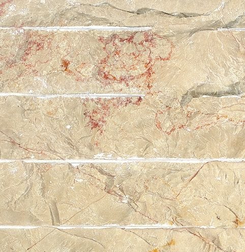 Color/Finish variation image for Limestone - Portuguese Alpine. The surface finishes shown are chiseled and rockfaced. Dominant colors shown are beige and tan; with orange/rust and cream secondaries. Exhibits "movement" and the color mix creates a warm feeling. Random, veined, linear and swirled color patterns.