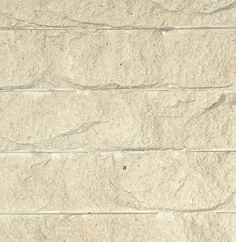 Color/Finish variation image for Royal White Limestone. The surface finish shown is chiseled. Dominant colors shown are beige, tan and cream. Exhibits "movement" and the color mix creates a warm feeling. Regular, random and fine speckled color patterns.