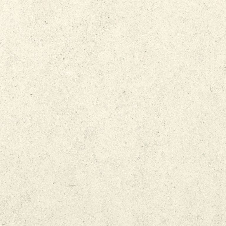 Close-up image for Snow White Limestone. The surface finish shown is honed. Dominant colors shown are beige, white and cream. The color mix creates a warm feeling. Solid color pattern.