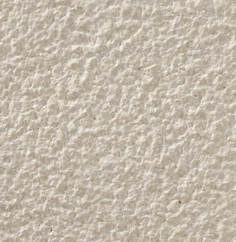 Color/Finish variation image for Cremcar Limestone. The surface finishes shown are brushed and bush hammered. Dominant colors shown are beige and tan; with brown, gray, orange/rust, white and cream secondaries. The color mix creates a warm feeling. Regular color pattern.