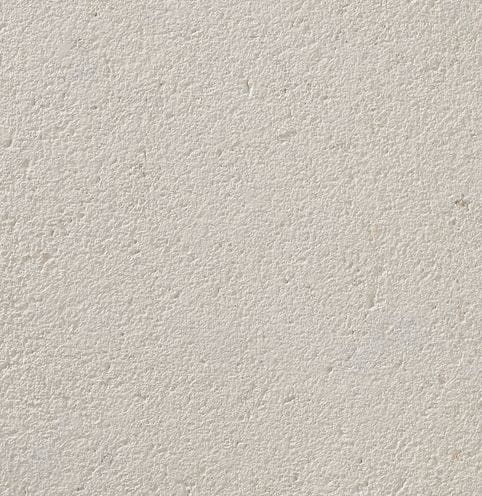 Color/Finish variation image for Coralau Limestone. The surface finish shown is sand blasted. Dominant colors shown are beige, gray and white; with a cream secondary. The color mix creates a cool feeling. Solid color pattern.